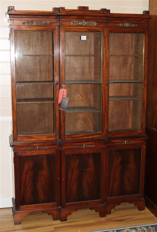 A George III style mahogany breakfront bookcase cupboard, W.120cm